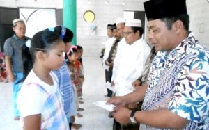Tradisi Memberi Makan Anak Yatim Usai Panen di Huraba